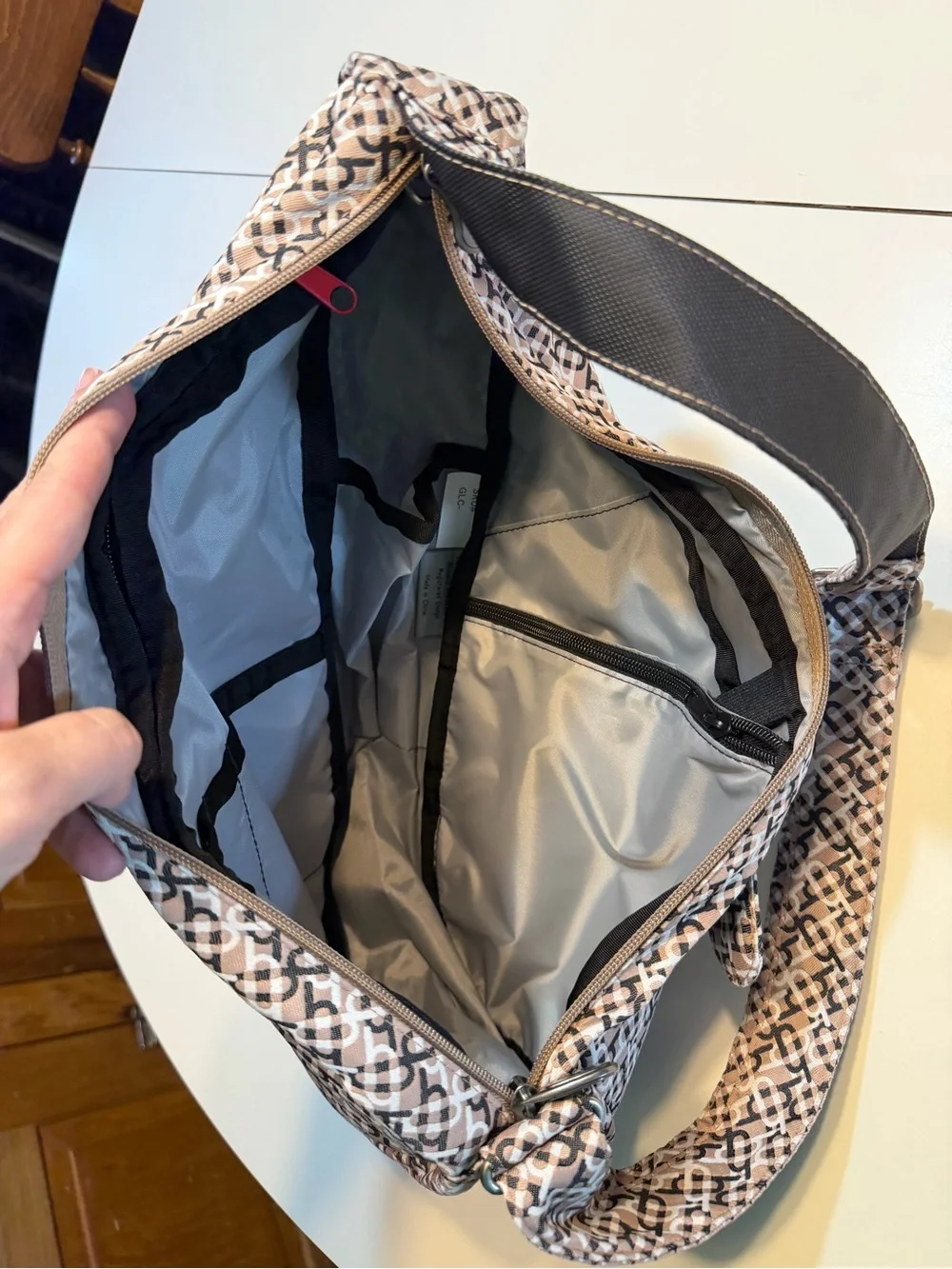 Ameribag Healthy Back Sling Bag Crossbody Brown Nylon Zips Pockets